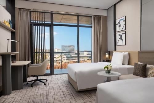 Katil atau katil-katil dalam bilik di Crowne Plaza Quzhou, an IHG Hotel