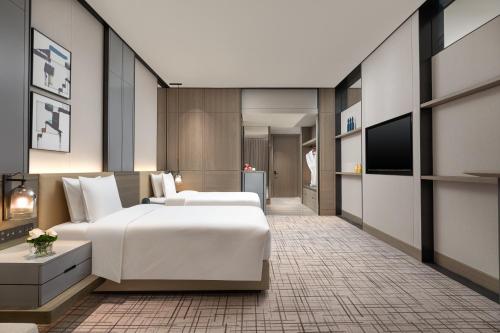 Katil atau katil-katil dalam bilik di Crowne Plaza Quzhou, an IHG Hotel