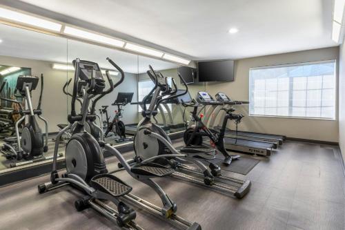 a gym with several exercise bikes in a room at City Express by Marriott Duluth in Duluth