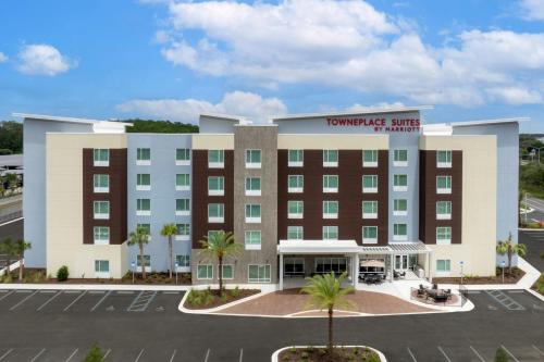 a rendering of a hotel with a parking lot at TownePlace Suites By Marriott Lake City in Lake City