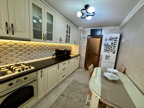 Dapur atau dapur kecil di Arena Apartment