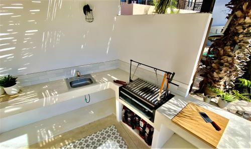 Η κουζίνα ή μικρή κουζίνα στο Apartment near the beach with terrace #10