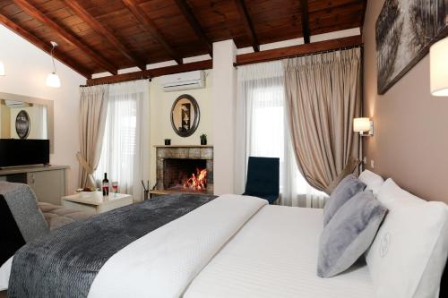 Postel nebo postele na pokoji v ubytování Asimina Guesthouse, Eptalofos Parnassos