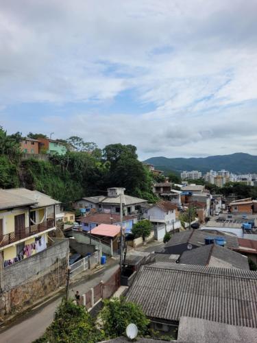 an overview of a town with houses and buildings at Casa Rover - Floripa in Florianópolis