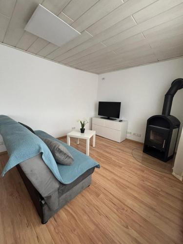 Μια τηλεόραση ή/και κέντρο ψυχαγωγίας στο Vidi Apartments Fils Blick