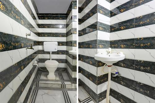Koupelna v ubytování Hotel O SAMRAT HOTEL