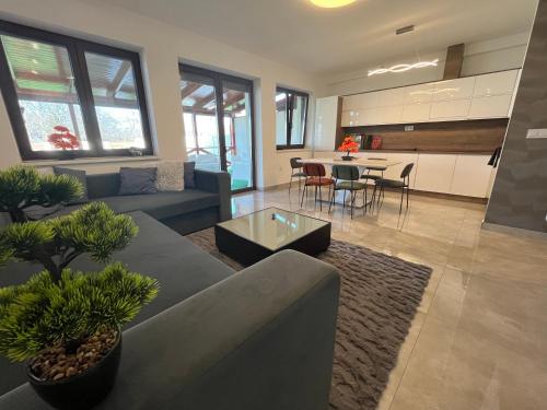 Kuchyň nebo kuchyňský kout v ubytování VRG 1 Exkluzív Apartman