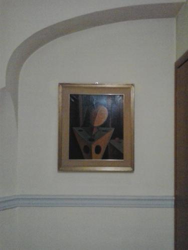 a picture of a painting on a wall at Hotel San Giorgio in Bergamo