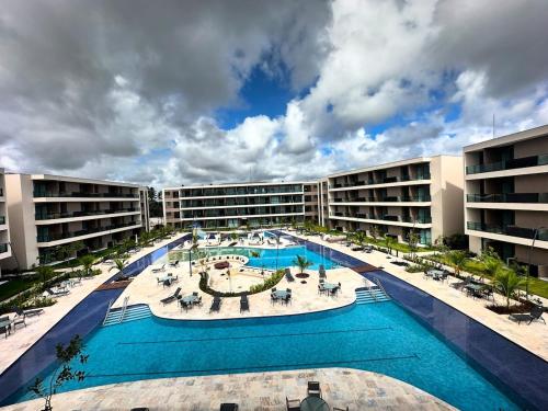 Bazén v ubytování Flat Aconchegante em Muro Alto - Porto de Galinhas nebo v jeho okolí