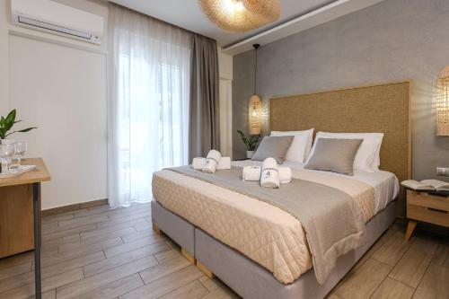 Postel nebo postele na pokoji v ubytování Alfa Boutique