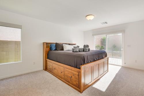 a bedroom with a large bed in a room at 10 Mi to The Strip Spacious Extended Vegas Stay! in Las Vegas