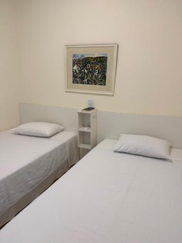 Ένα ή περισσότερα κρεβάτια σε δωμάτιο στο CR Hotel