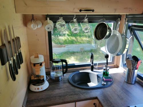 Η κουζίνα ή μικρή κουζίνα στο Tiny House im Grünen
