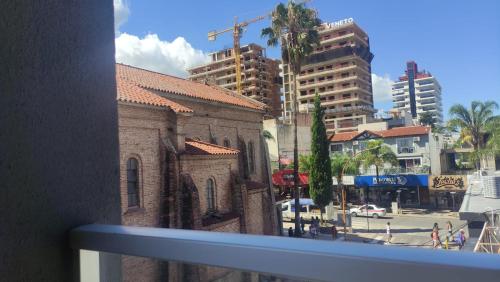 a view of a city street from a balcony at Departamento Premium Aqua II in Villa Carlos Paz