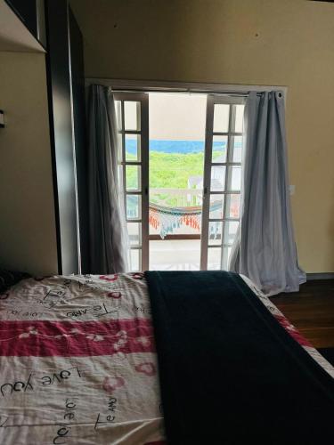 Katil atau katil-katil dalam bilik di Recreio Guest House