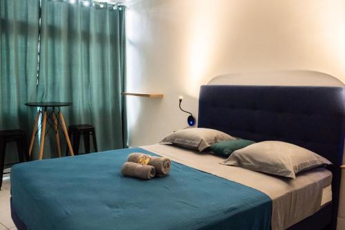 Una cama o camas en una habitación de B787 AF city center room