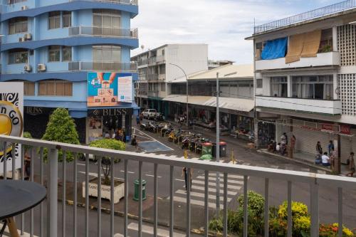 an overhead view of a city street with buildings at A340 citi center room in Papeete