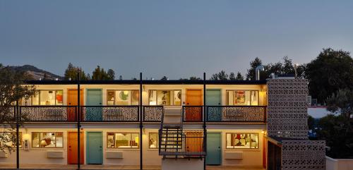 an apartment building with colorful doors and windows at The Astro in Santa Rosa