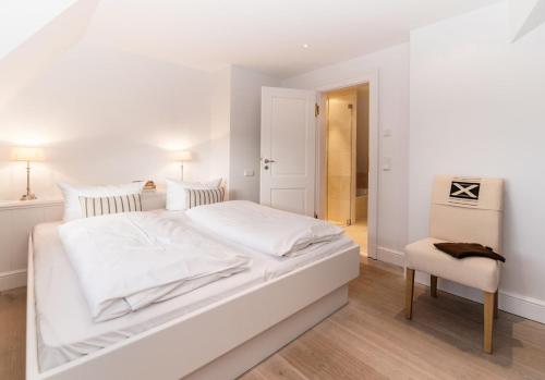 Postel nebo postele na pokoji v ubytování LITZKOW 11301