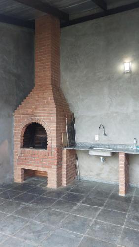 Fotografie z fotogalerie ubytování Casa no módulo 3 da Riviera de São Lourenço com churrasqueira e piscina privativas, 300m da praia v destinaci Bertioga