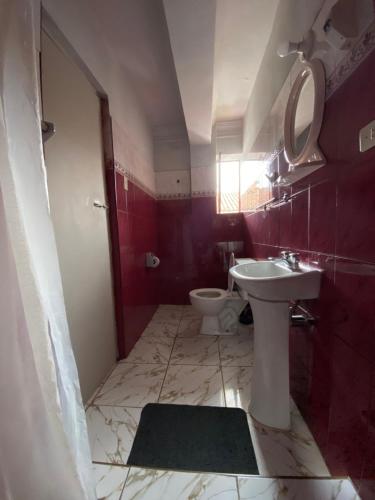 a bathroom with a sink and a toilet at Templo de la Luna in Cusco