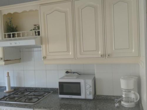 Η κουζίνα ή μικρή κουζίνα στο Apartamento luminoso con vistas a la ría