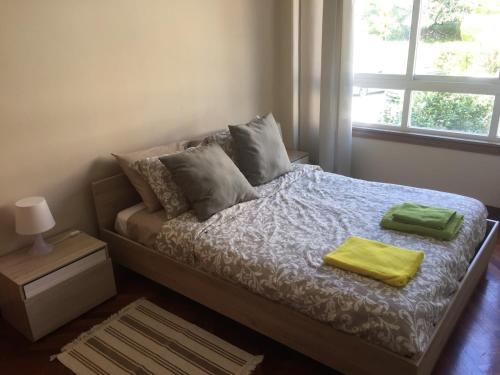Ένα ή περισσότερα κρεβάτια σε δωμάτιο στο Apartamento luminoso con vistas a la ría