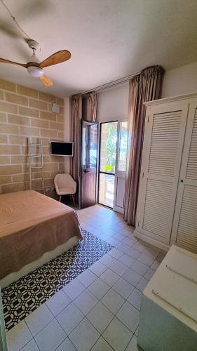 Ένα ή περισσότερα κρεβάτια σε δωμάτιο στο Casa Armonia