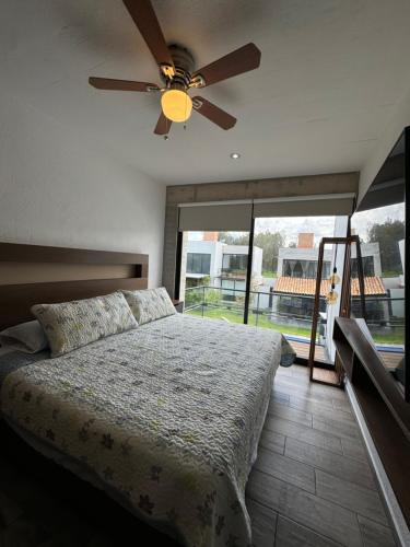 Ένα ή περισσότερα κρεβάτια σε δωμάτιο στο Residencial entre Viñedos