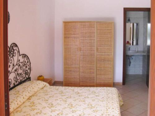 Cama o camas de una habitación en Apartment in Costa Rei with Stunning Sea View