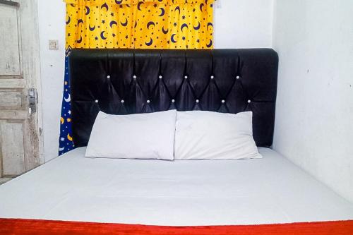 Фотография из галереи Bima Homestay Puncak RedPartner в городе Campaka