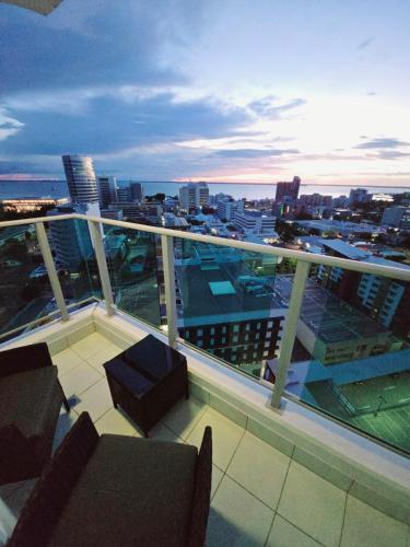a balcony of a building with a view of a city at Skyview 2 bathroom Sub-Penthouse Harbour Views in Darwin