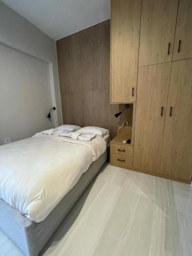 Lova arba lovos apgyvendinimo įstaigoje Chris Apartment