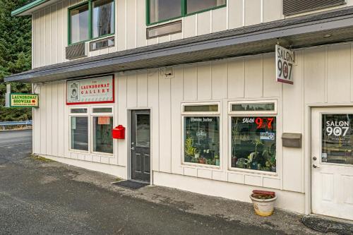 a store front of a building with windows at Harbor Views 3 - Walkable in the Heart of Auke Bay in Mendenhaven