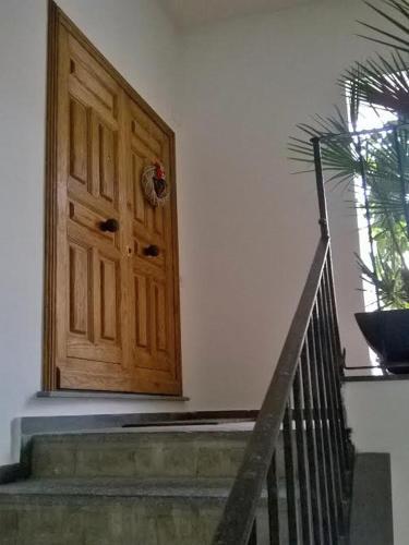 a wooden door on the side of a building at Estate4home - Surreo Luxury B&b in Sorrento