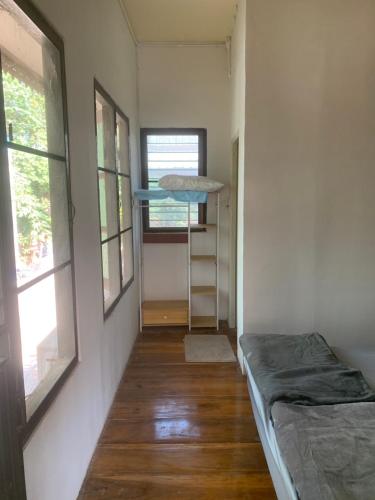 Ένα ή περισσότερα κρεβάτια σε δωμάτιο στο Baan Thiw Thung near the bus station Free pick-up