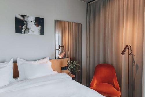 En eller flere senge i et værelse på Story Hotel Studio Malmo, part of JdV by Hyatt