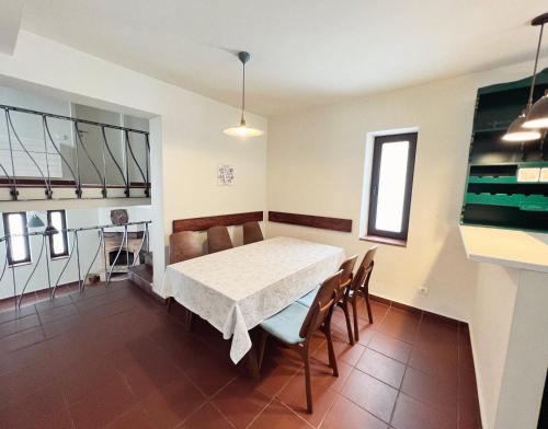 a dining room with a table and chairs at Teghenis Resort in Tsaghkadzor