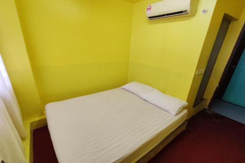 Postel nebo postele na pokoji v ubytování D'BJ Motel
