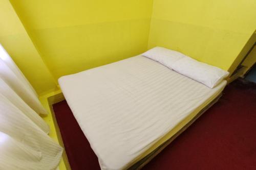 Postel nebo postele na pokoji v ubytování D'BJ Motel