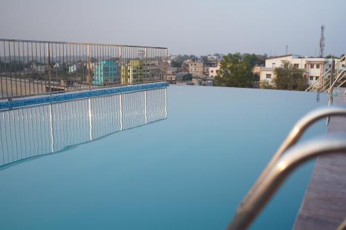 a view from the top of a swimming pool at Swet Palash Resort in Purulia
