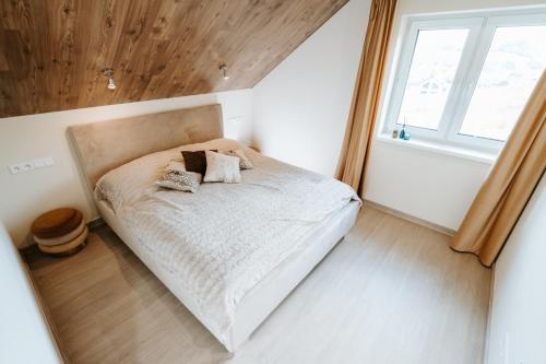 Ένα ή περισσότερα κρεβάτια σε δωμάτιο στο Apartmány “Chaty Krušetnica “