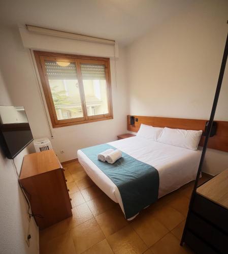 Katil atau katil-katil dalam bilik di Hostal Legaz