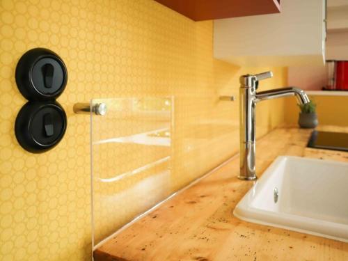 a bathroom with a sink and a faucet at Naturferienhaus Klein Rosenburg für 2 Personen in Klein Rosenburg
