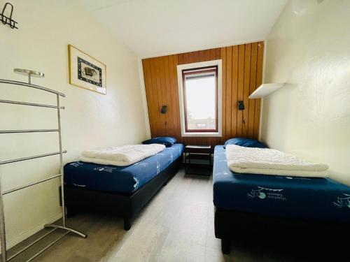 Ένα ή περισσότερα κρεβάτια σε δωμάτιο στο Lamsoor 2A*