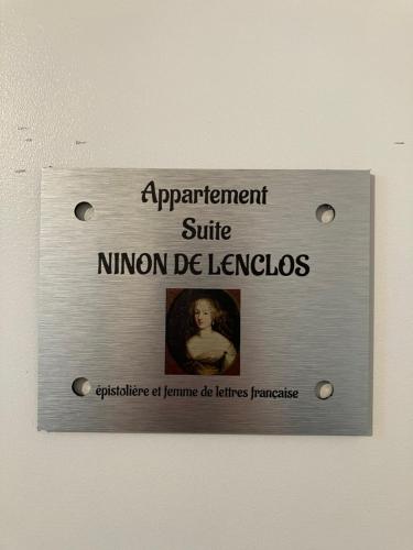 a sign on a wall that says appointment suite niuman de ligneolis at Les logis de Kergoulou in Concarneau