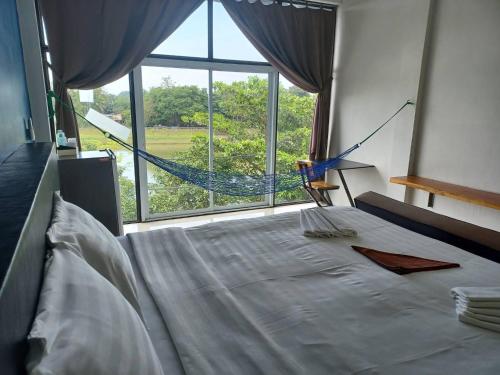 Postel nebo postele na pokoji v ubytování Nava Tara Resort