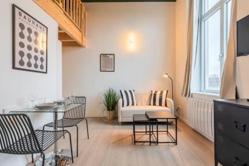 Χώρος καθιστικού στο Studio équipé pour une personne