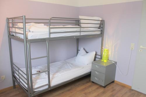 Katil atau katil-katil dalam bilik di StayInn Hostel und Gästehaus