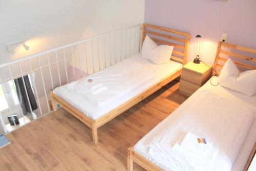 Katil atau katil-katil dalam bilik di StayInn Hostel und Gästehaus